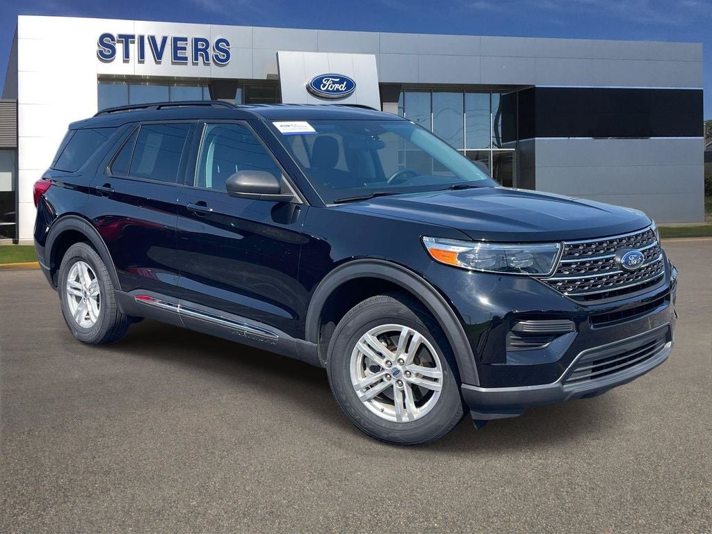 2023 Ford Explorer XLT in Black Metallic — front three-quarter view
