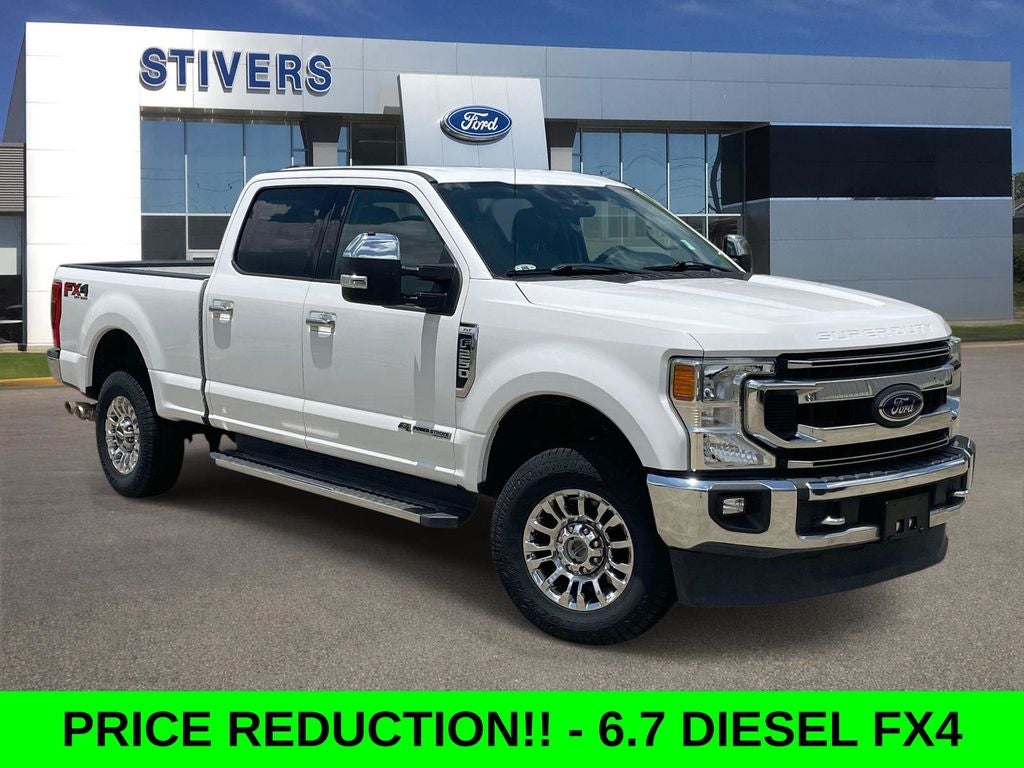 2021 Ford F-250SD XLT in Oxford White — front three-quarter view