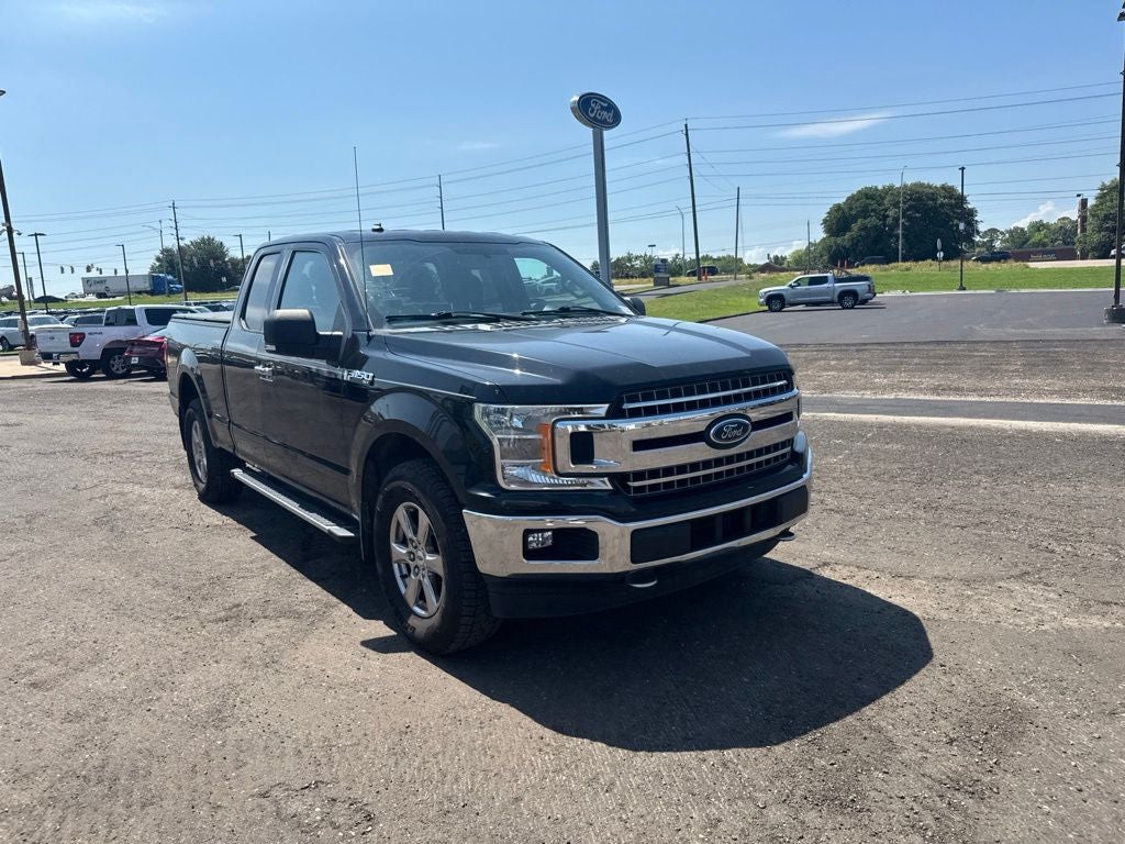2018 Ford F-150 XLT in Guard Metallic — front three-quarter view