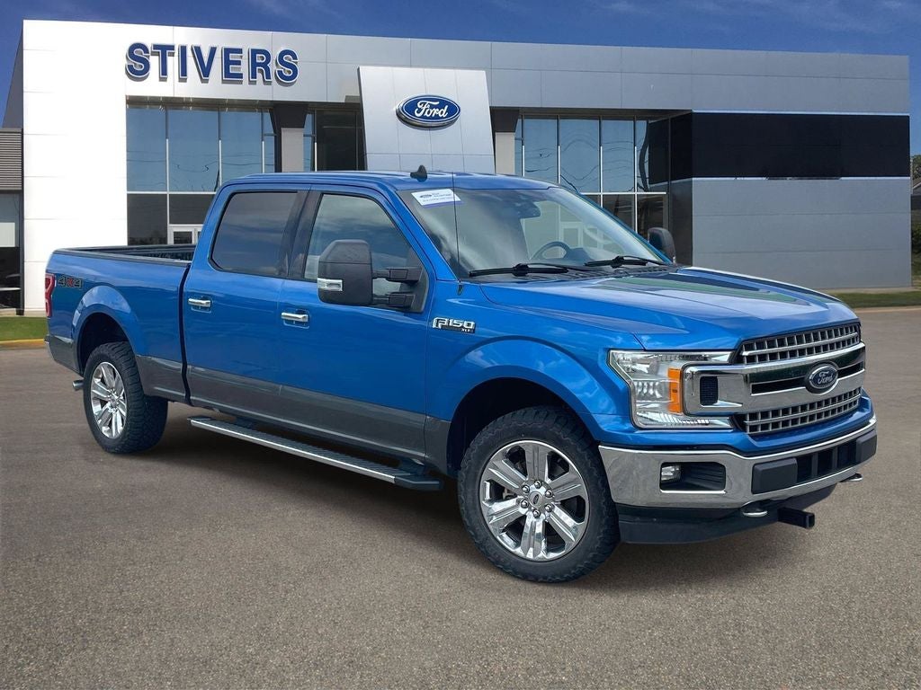 2019 Ford F-150 XLT in Velocity Blue Metallic — front three-quarter view