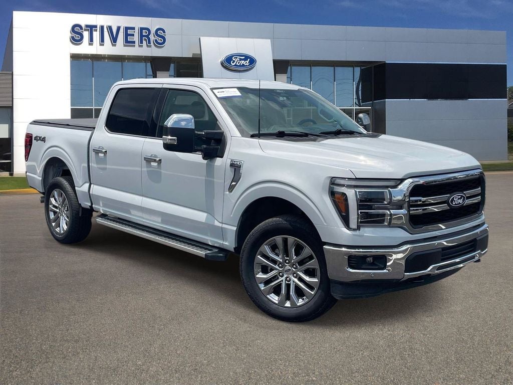 2025 Ford F-150 Lariat in White Metallic — front three-quarter view