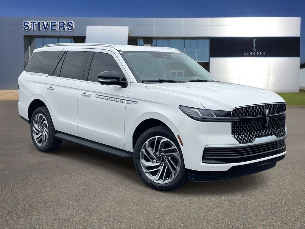 2026 Lincoln Navigator Premiere in Star White Metallic Tri-Coat — front three-quarter view